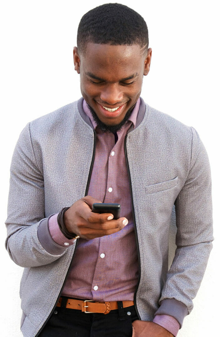 A man looking at his cell phone